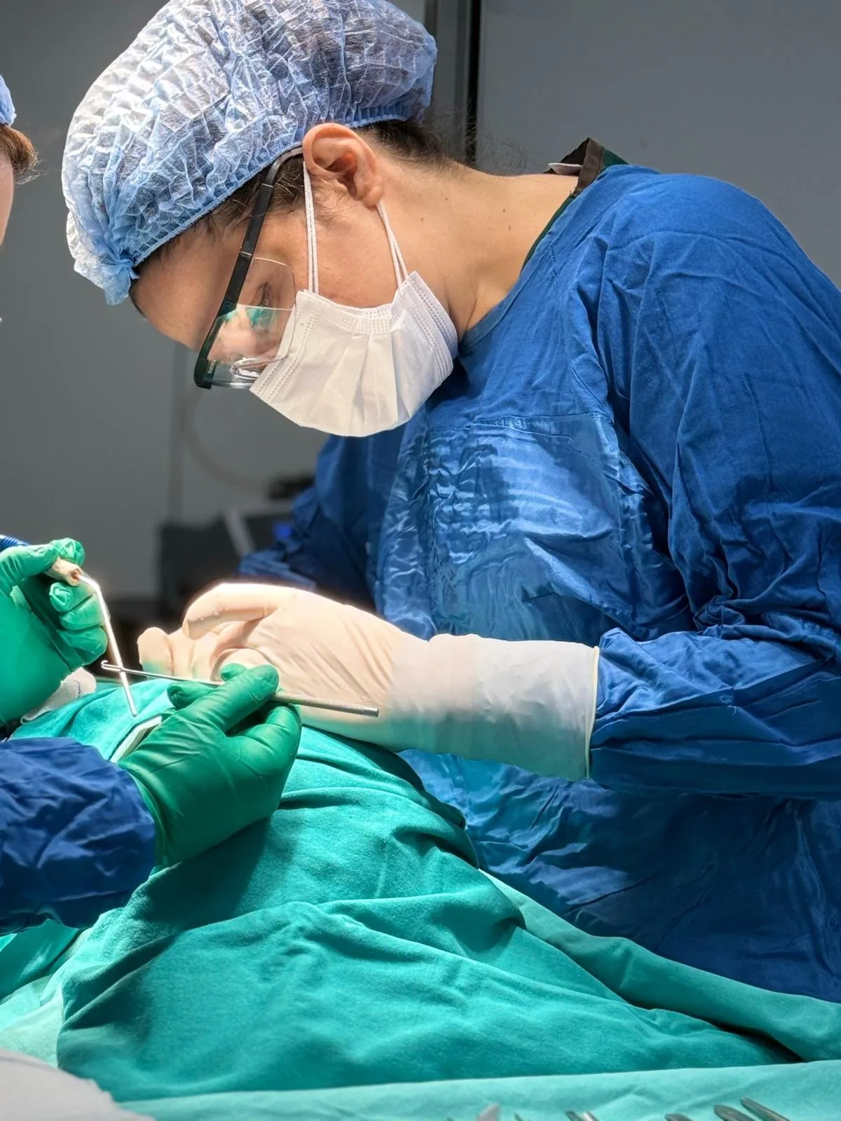 Surgical team during a facial plastic surgery procedure
